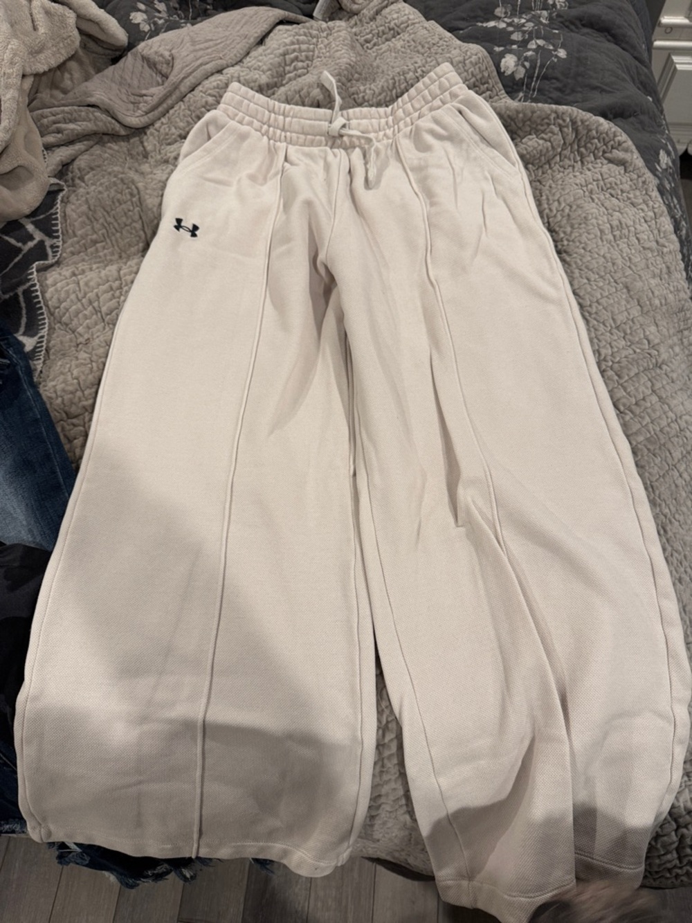 Under armor, cream colored wide leg pants. Size small